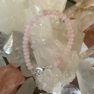 Genuine rose quartz, aprox. 4mm seed bead bracelet with silver clasp 5 1/2 in